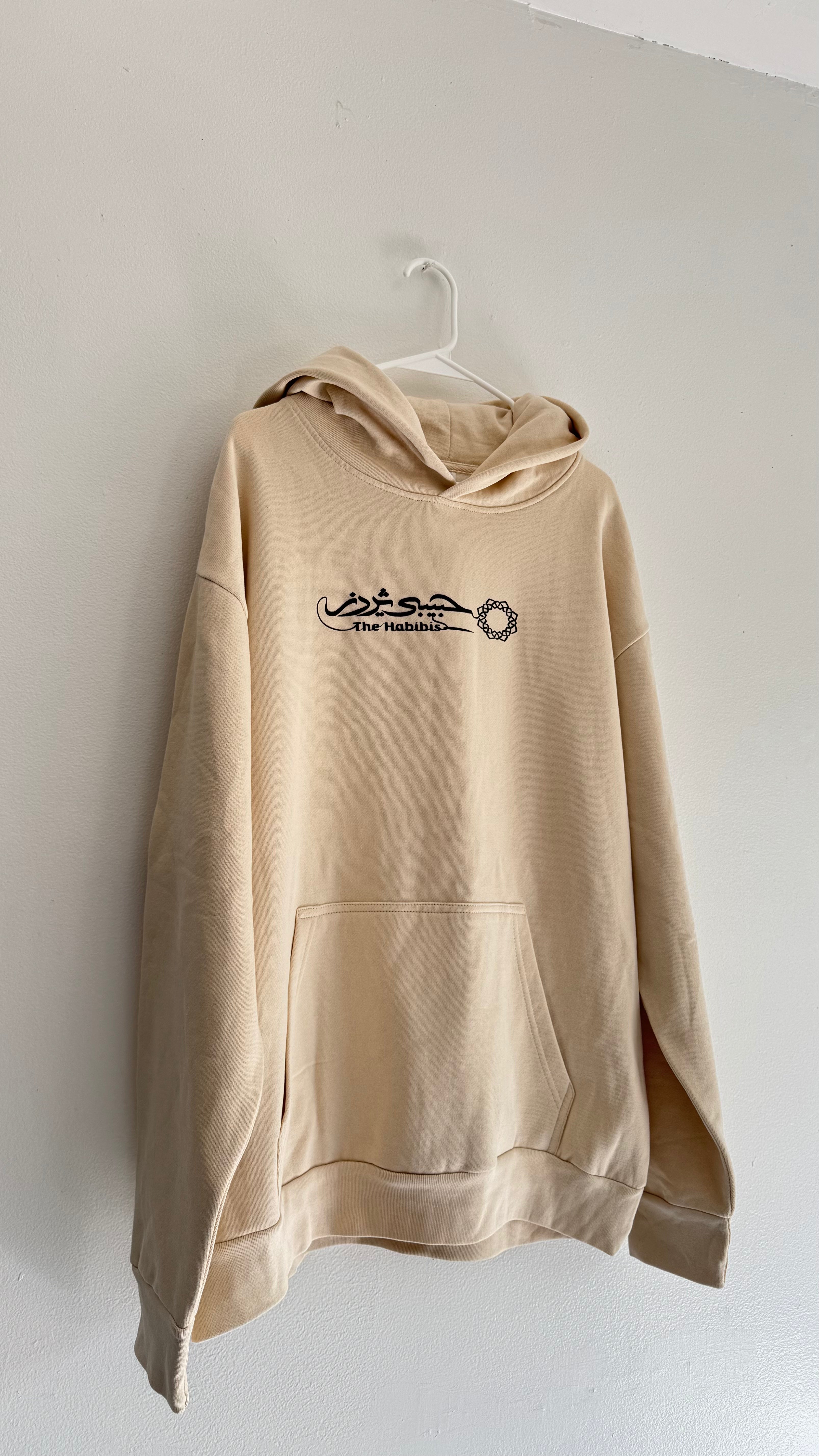 From Dust Hoodie (Cream · Black Puff)