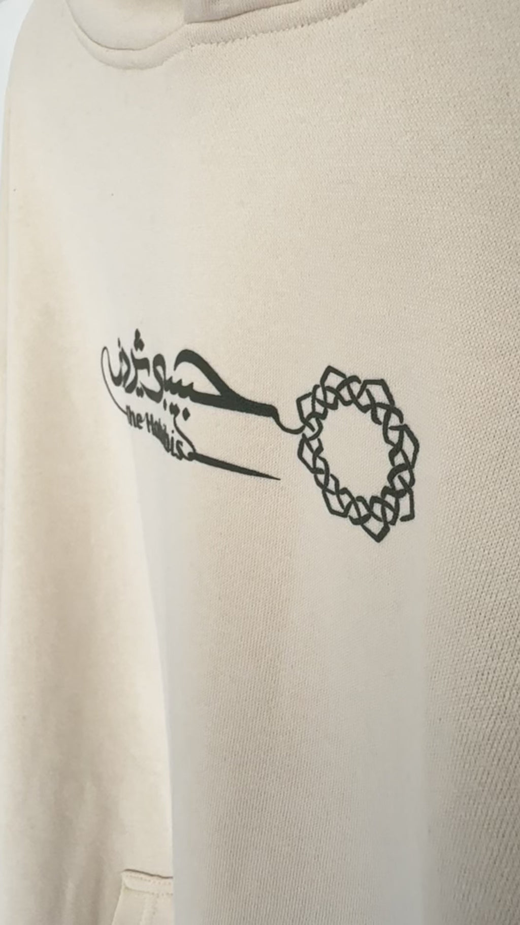 From Dust Hoodie (Cream · Black Puff)